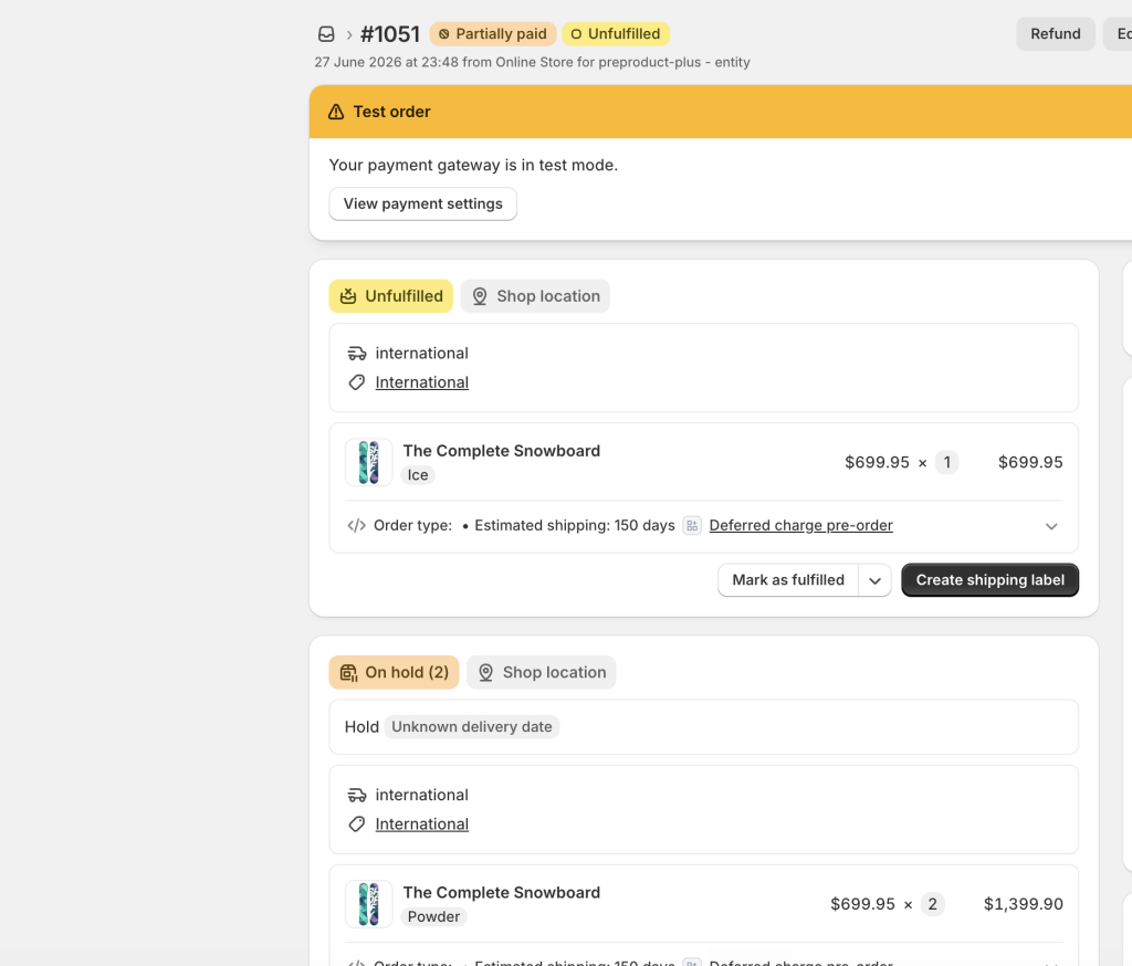 A Shopify order where one pre-order line item has been charged and another is still outstanding