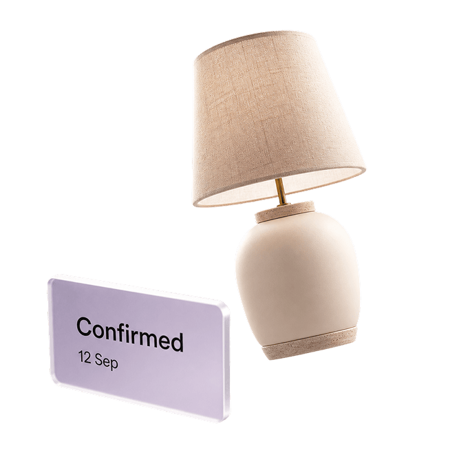 A ceramic table lamp beside a lilac card reading Confirmed, 12 Sep