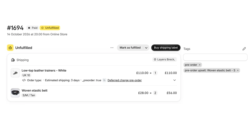 A Shopify order holding a trainers pre-order and an added woven elastic belt in the same unfulfilled shipment, tagged pre-order upsell: Woven elastic belt.
